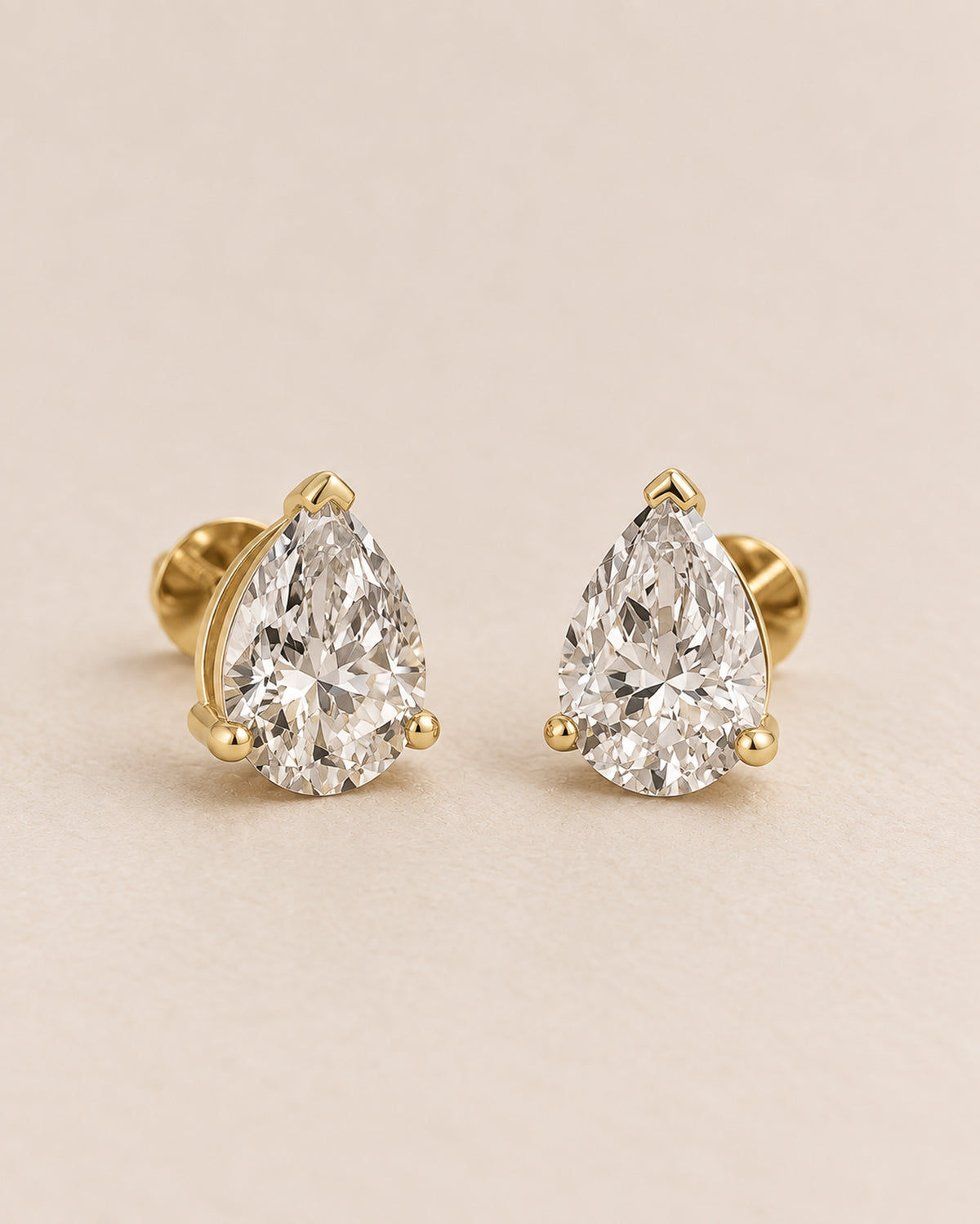Rommé Signature Pear Diamond Studs in Gold